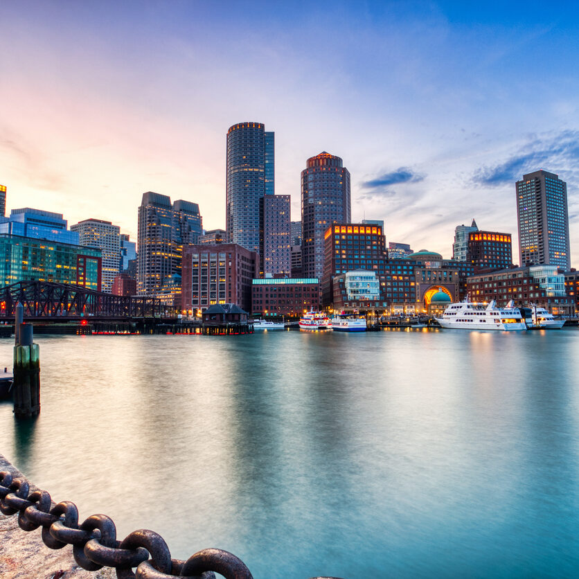 Boston Skyline with Financial District and Boston Harbor at Sunset, USA Boston Skyline with Financial District and Boston Harbor at Sunset, USA